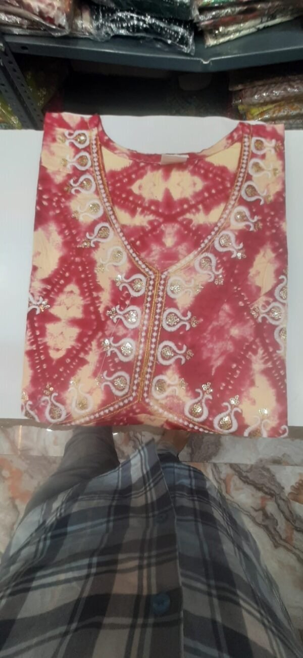 NAIRA CUT TOP
